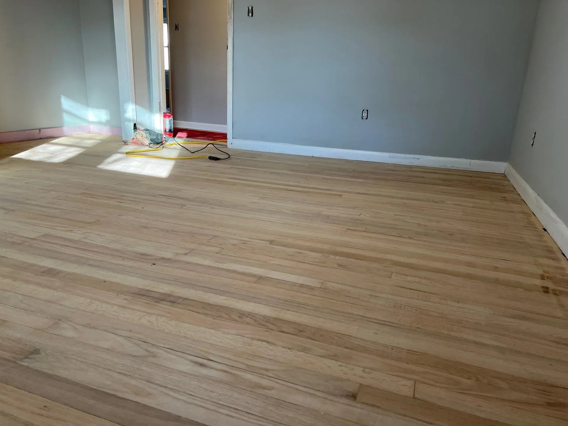 New hardwood flooring installed during home renovation project in New Haven County, CT