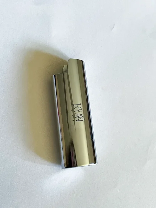 Name engraved on silver bic lighter sleeve
