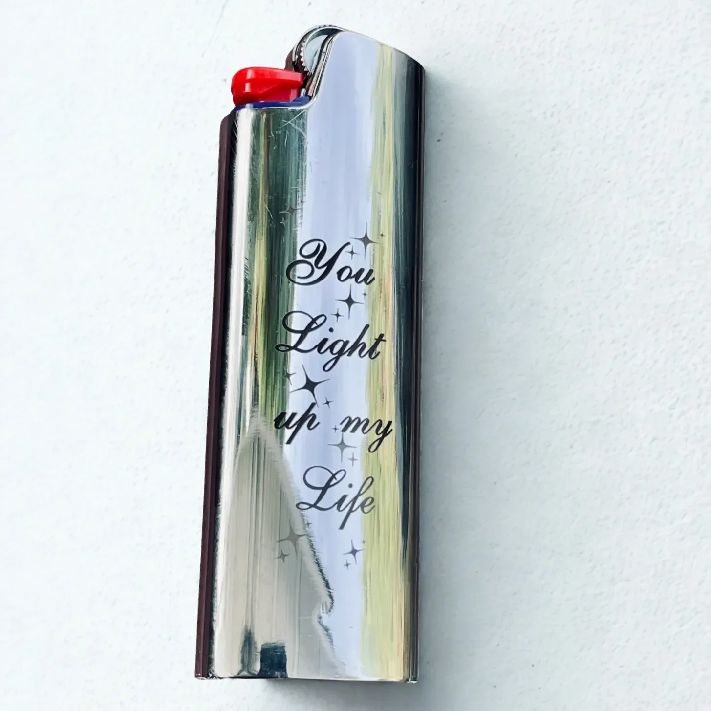 Add a touch of style to an everyday essential with Babe’s Hardware custom engraved stainless steel lighter case, designed to fit standard Bic lighters.