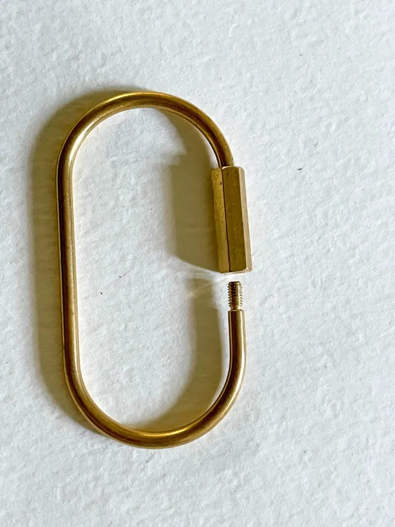 Unscrewed mini oval shape carabiner to load keys