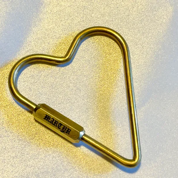 gothic font engraving on brass heart shape carabiner keychain