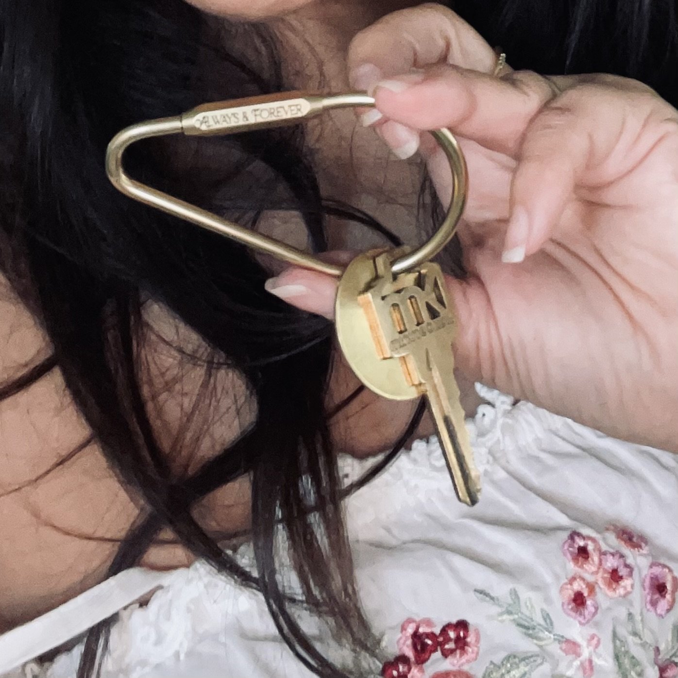Custom engraved brass teardrop key ring with hex screw lock, attached to a belt loop – sleek everyday carry accessory for men and women.