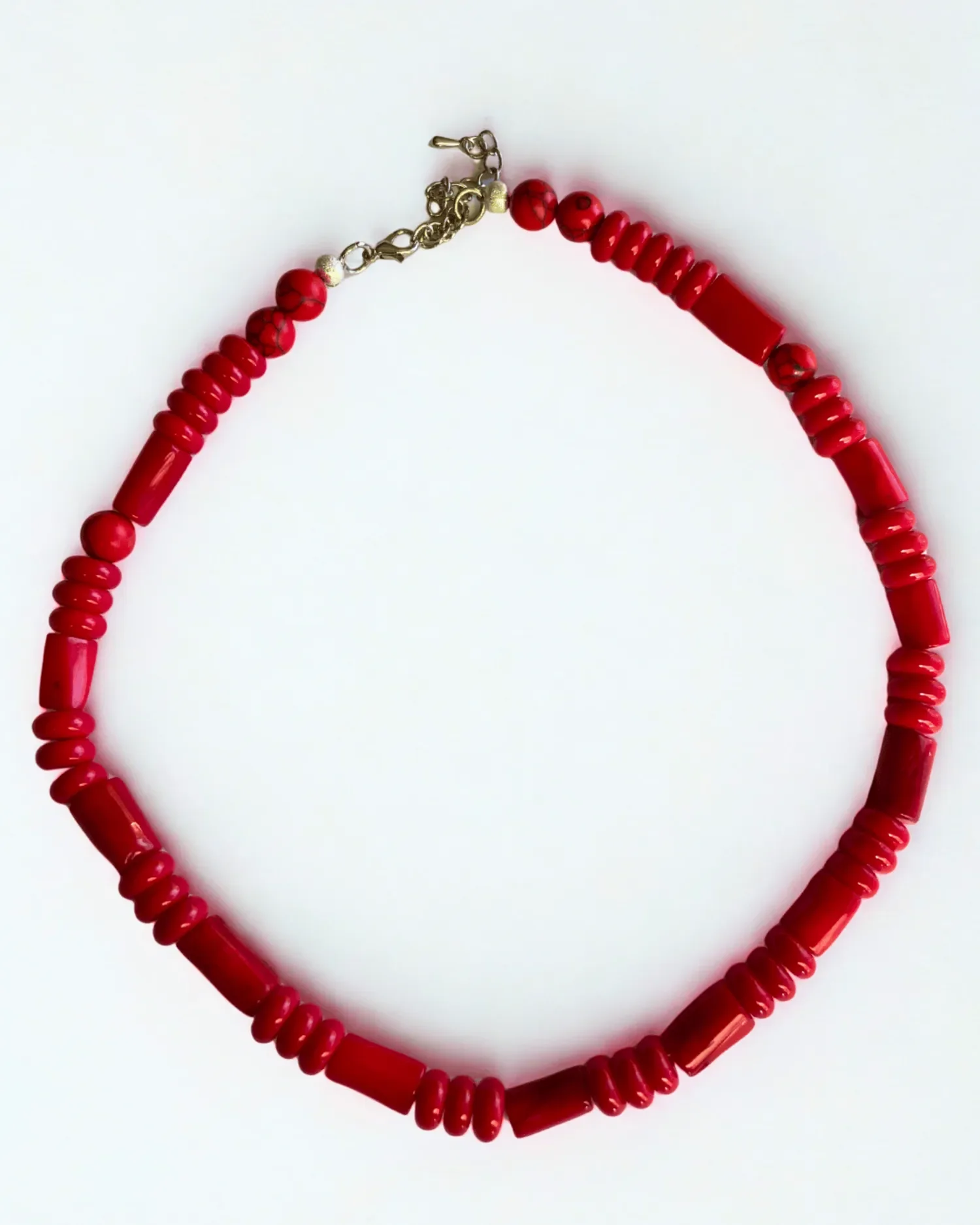 The Scarlett Necklace – handmade red beaded necklace with sterling silver clasp, featuring red bamboo nugget, red glass disc, and red jasper beads.