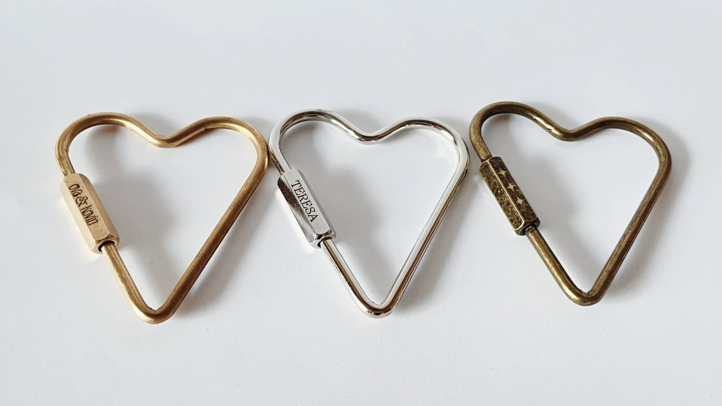 Custom Engraved metal heart shape key rings by babes hardware