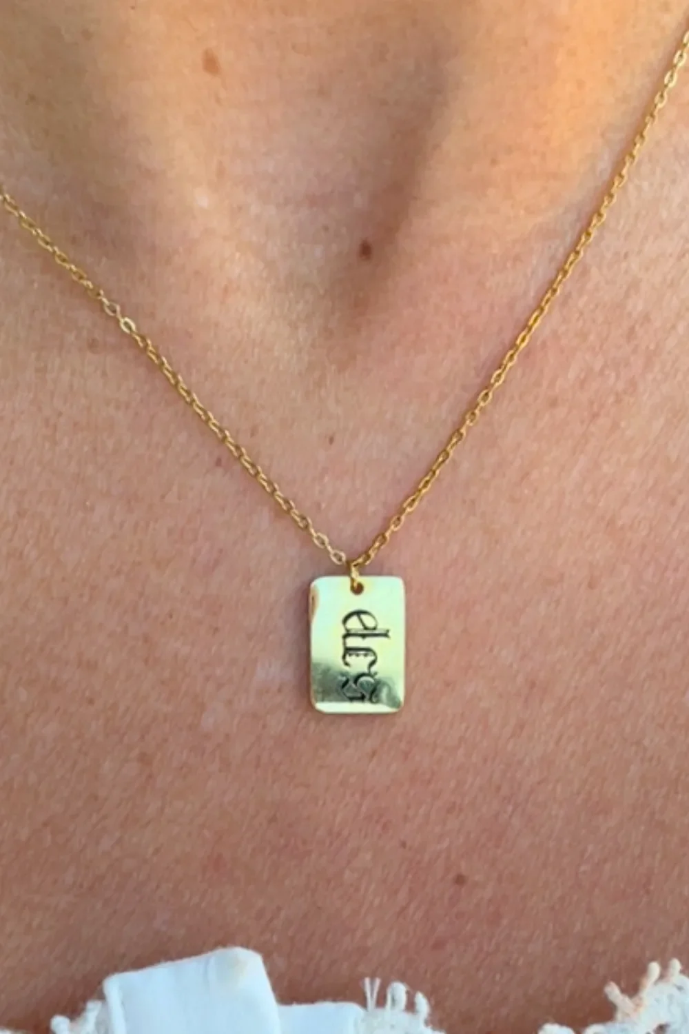engraved gothic initials mini gold rectangle tag necklace