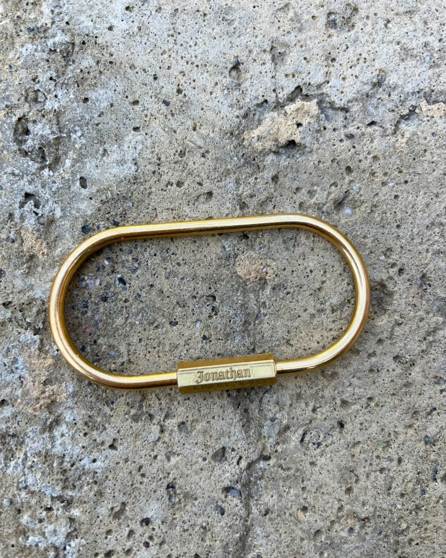 two custom brass oval shape carabiner keyrings