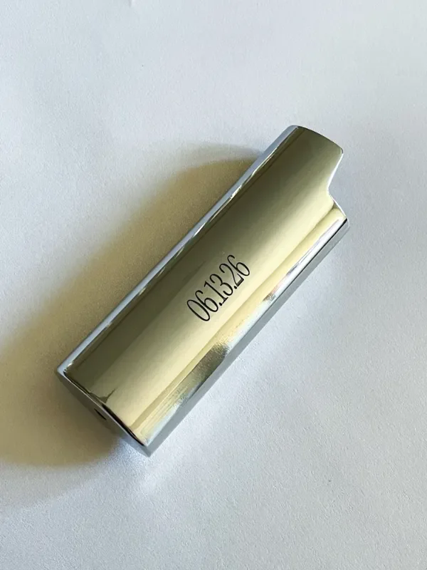 Engraved date on silver lighter case