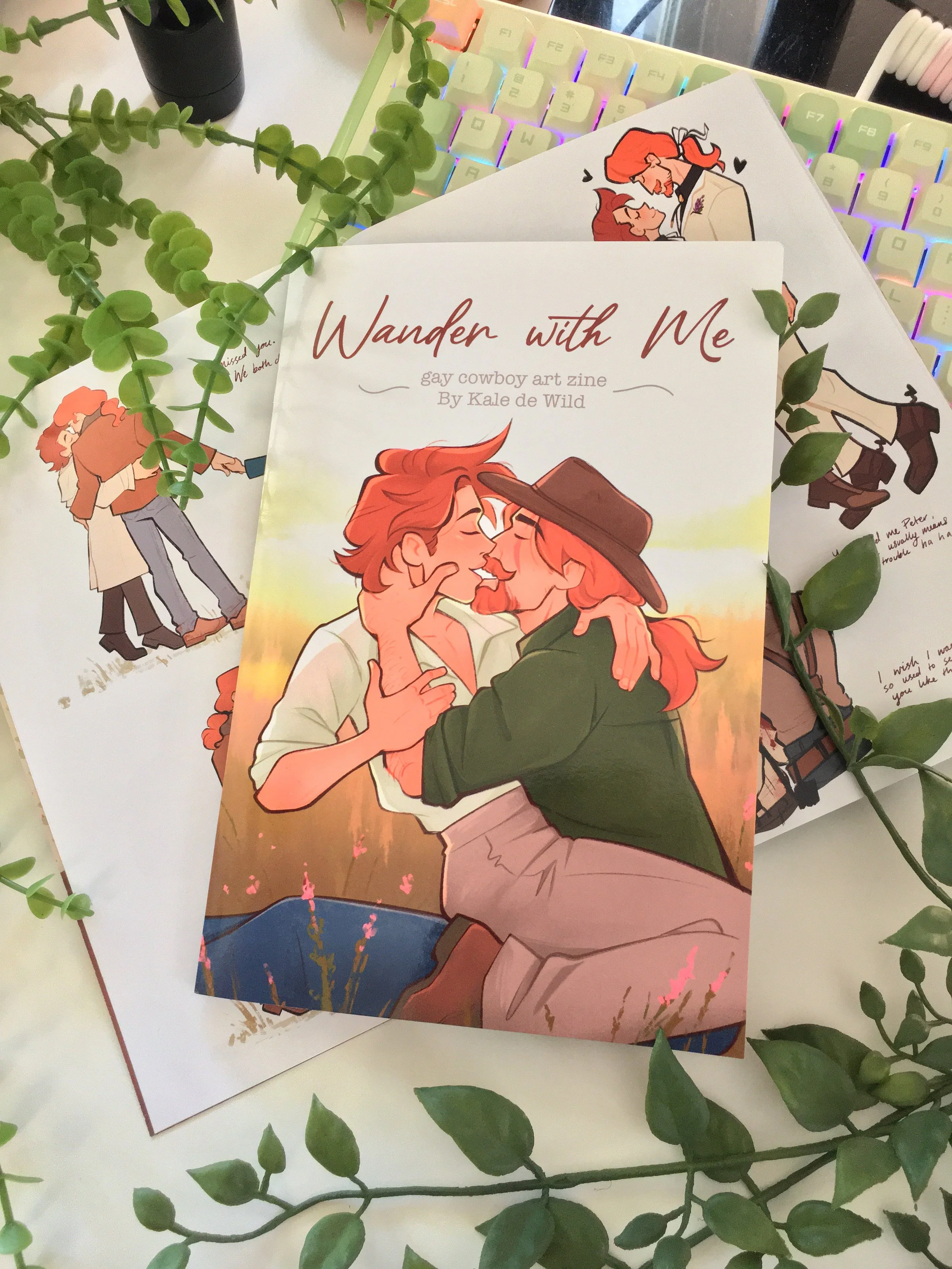 Joenie is a man cursed with immortality, and Pecan is the cowboy who fell in in love with a tragic man. Wander with Me is an artbook narrated by Pecan as he the recounts happy moments with the man he loves.