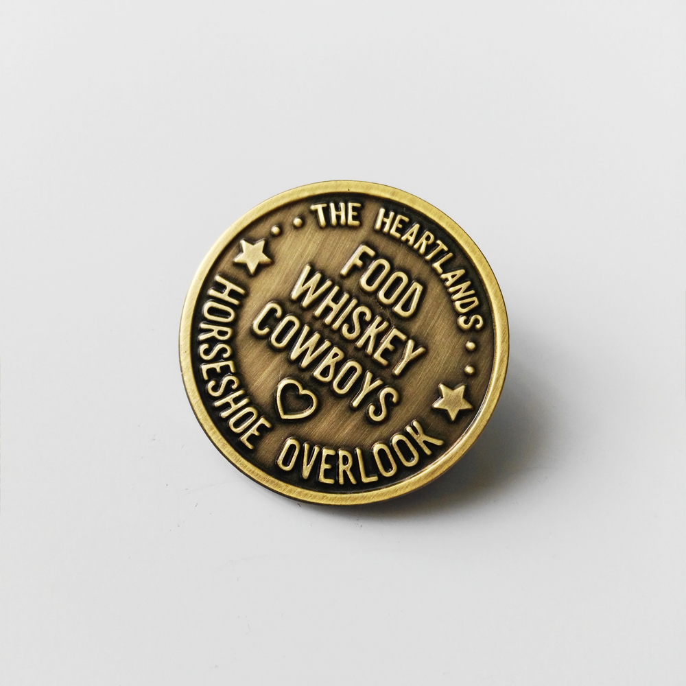 Enamel_CowboyToken_Pin_02.png