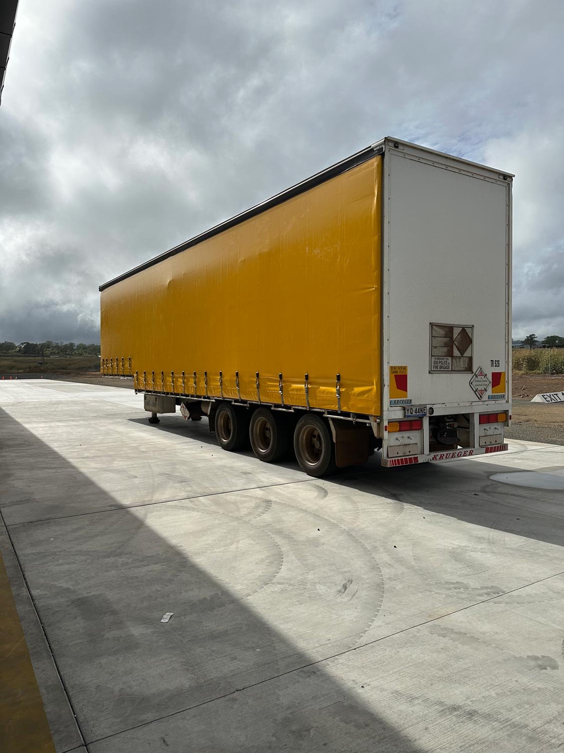 truck-with-yellow-tarpaulin.jpg