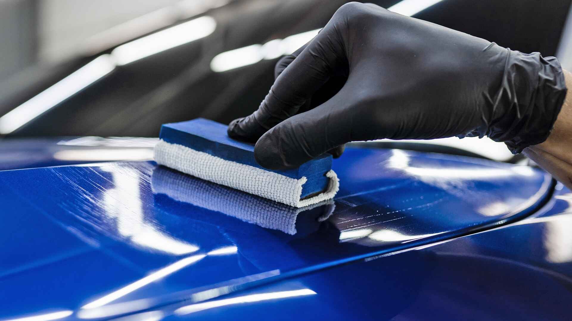 applying-ceramic-coating-to-a-blue-car-2451716400(1).jpeg