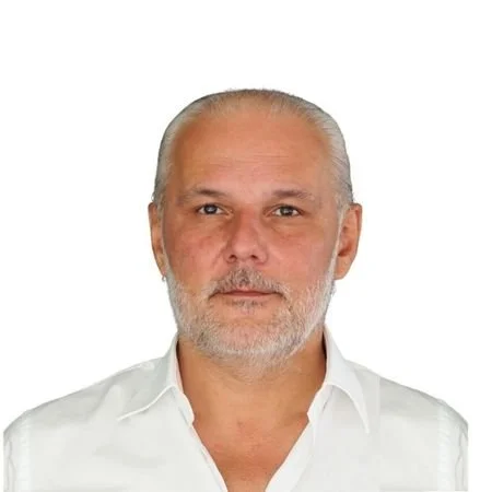 A man in a white shirt.