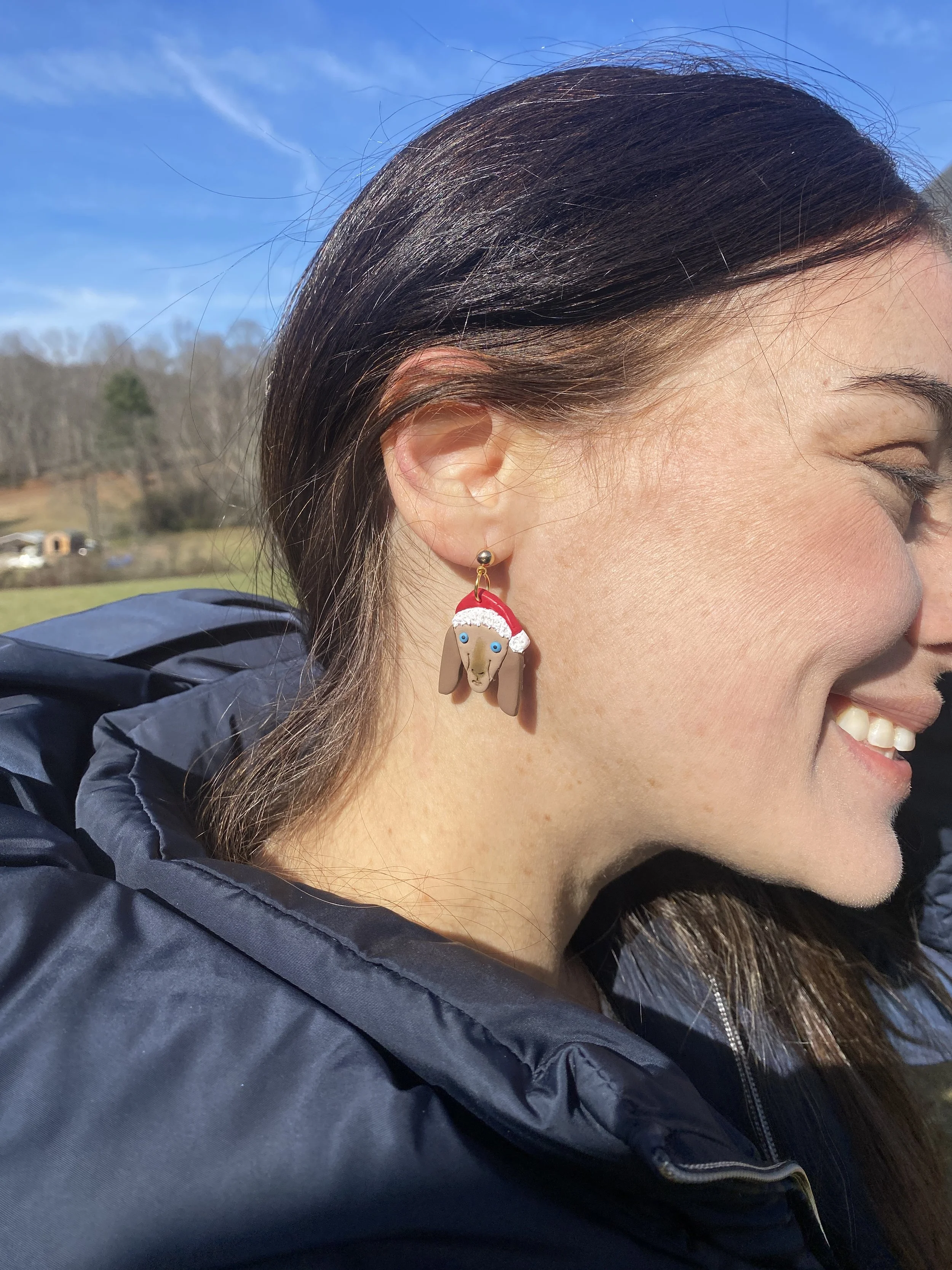 Holiday farm charm earring close up.JPG