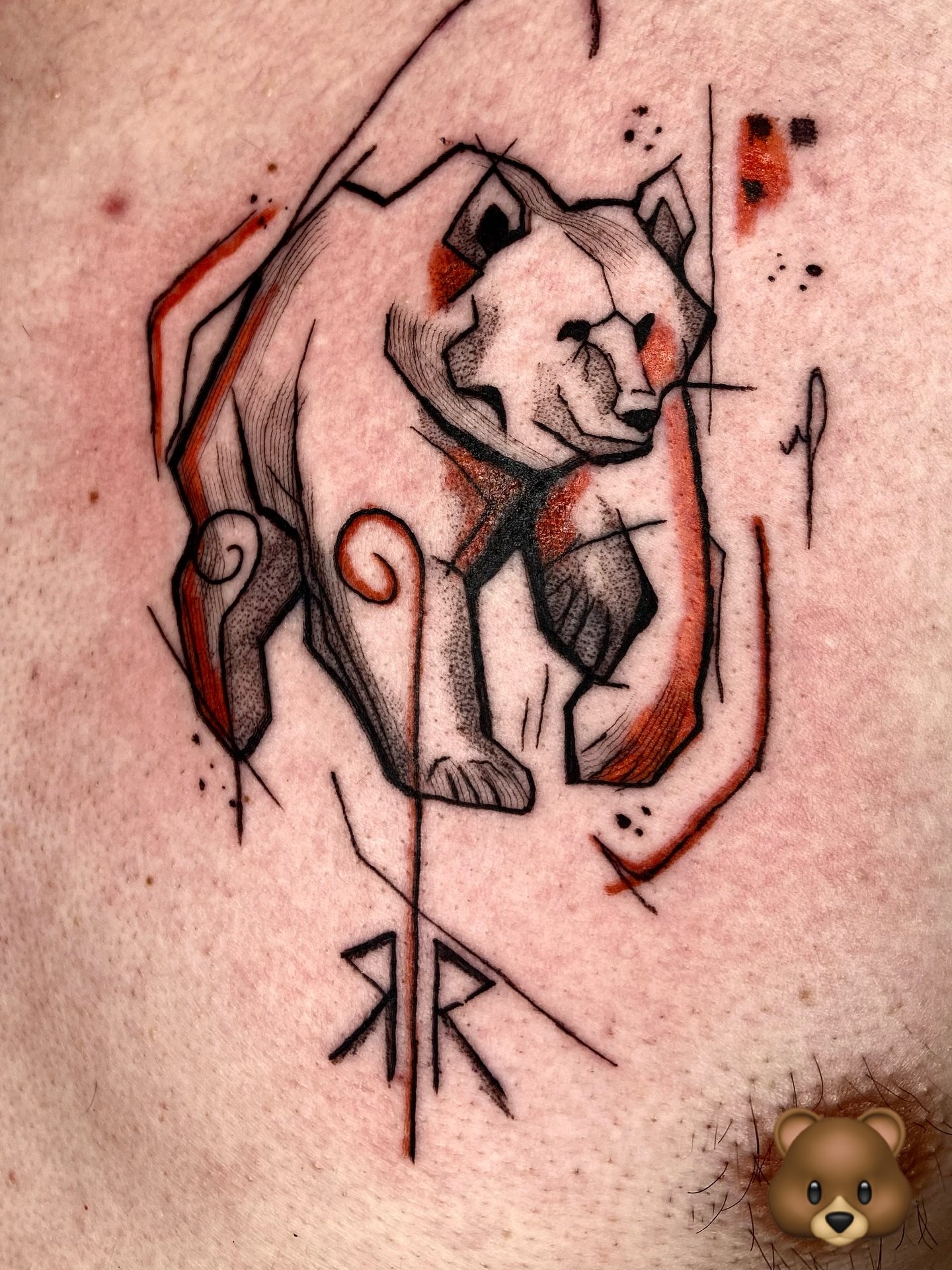 A memorial. 
This abstract bear tattoo was based on the clients Kalevala bear necklace he received from his passed away mother. 
I think this was a really beautiful way of keeping a lost one near your heart. 
We added the initials in old Celtic ruins