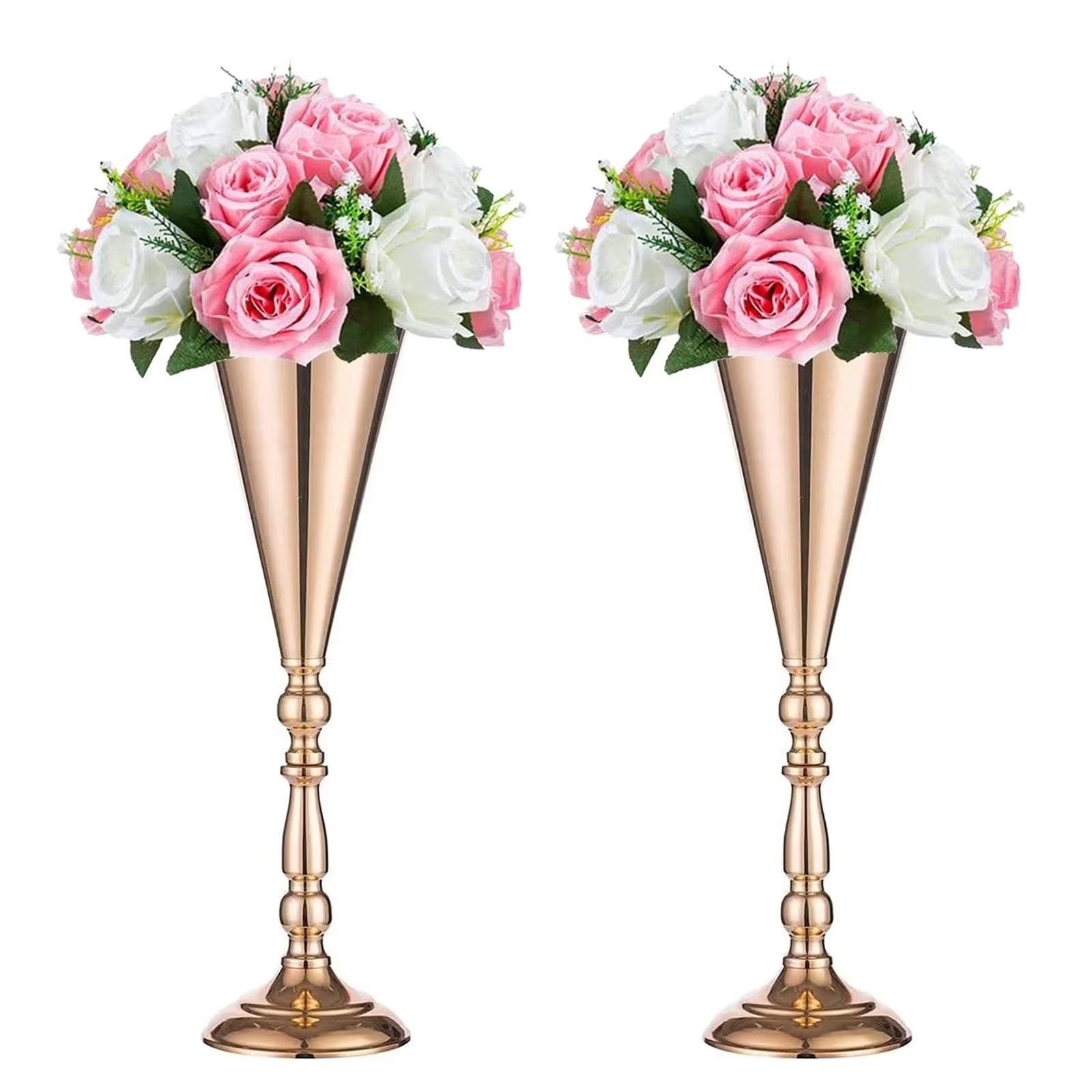 Two identical flower arrangements in tall gold vases filled with pink and white roses, green leaves, and small white filler flowers, on a white background.