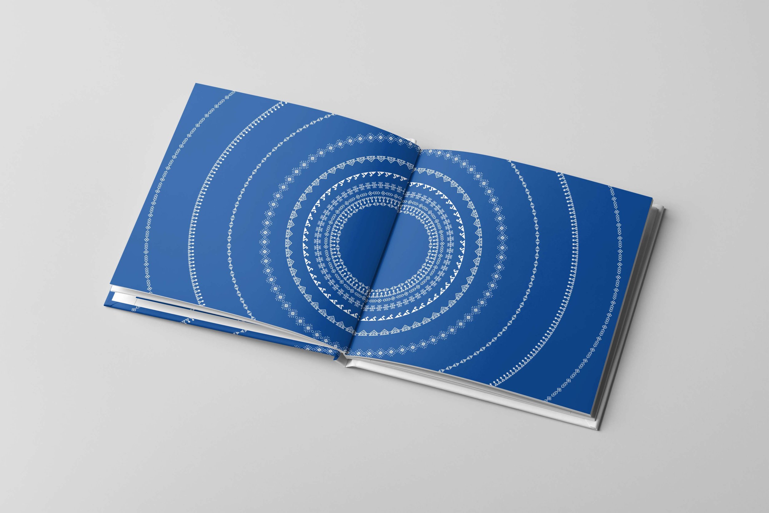 02_Square Book Mock up 2.jpg