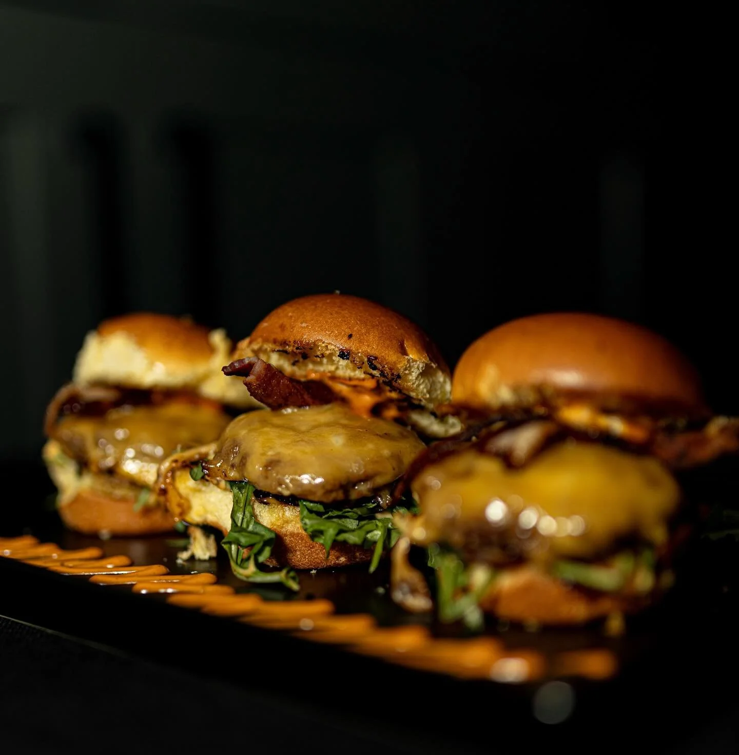 It’s burger season, and we’re bringing the heat! 🔥🍔
Our steakhouse sliders are the perfect bite-size. Enjoy delicious, curated foods while spending quality time with your guests.
ELEVATE YOUR NEXT BBQ. Let us fire up the grill for yo