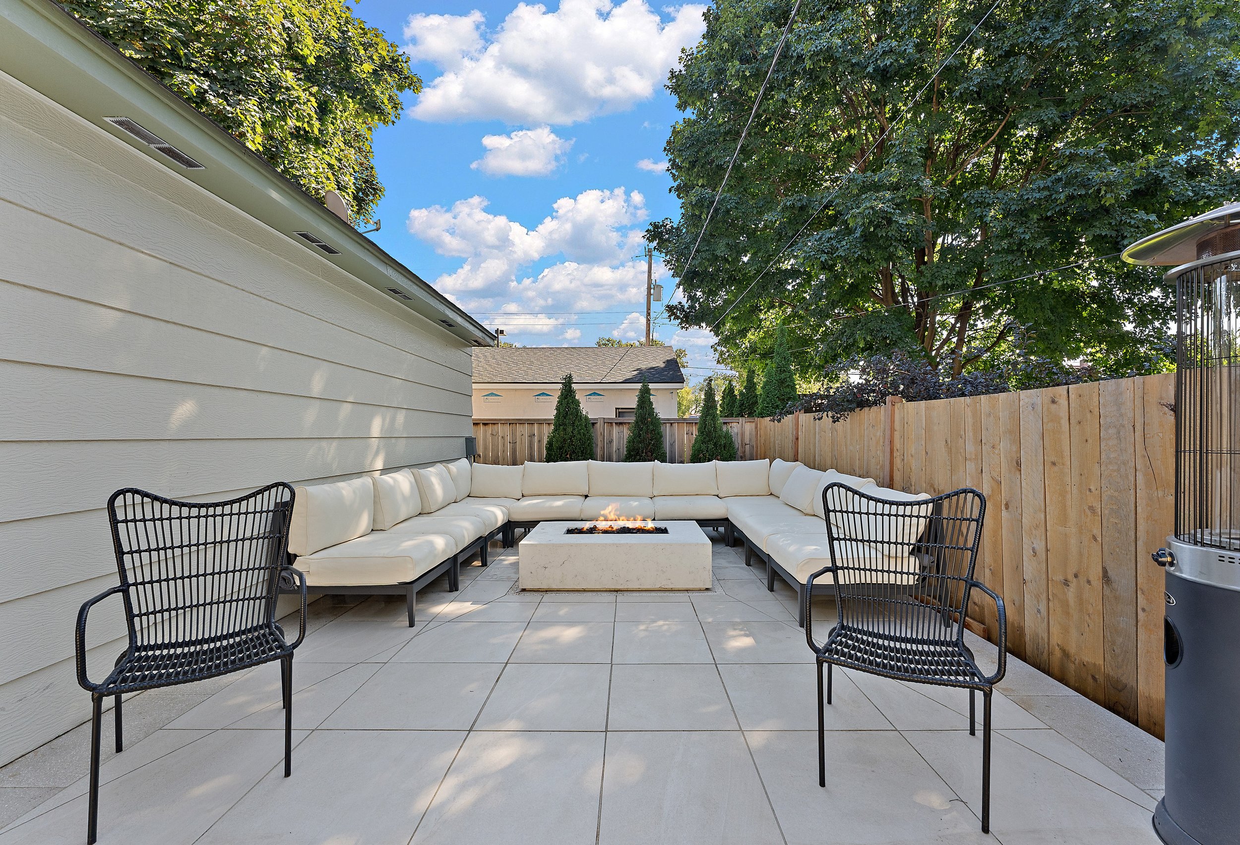 elevated gas fire pit on patio