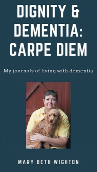 Book cover titled 'Dignity & Dementia: Carpe Diem' by Mary Beth Wighton, featuring a woman holding a dog.