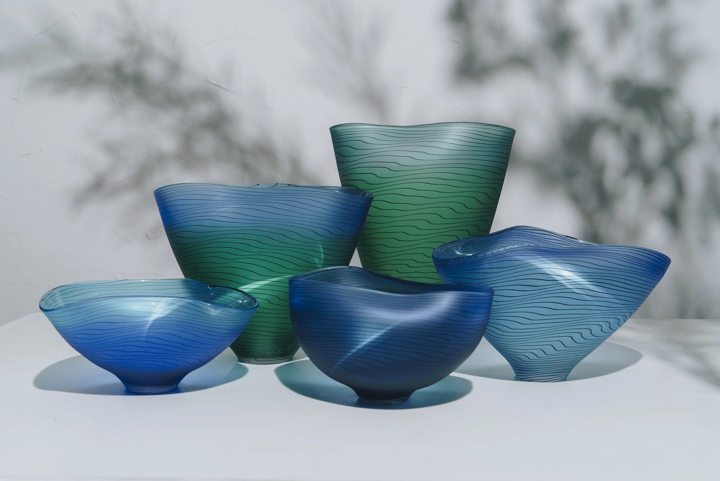 Ripple Vessels
blown and coldworked glass