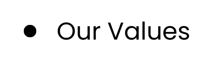 A white oval sign with black text that says 'Our Values' and a black dot next to the text.