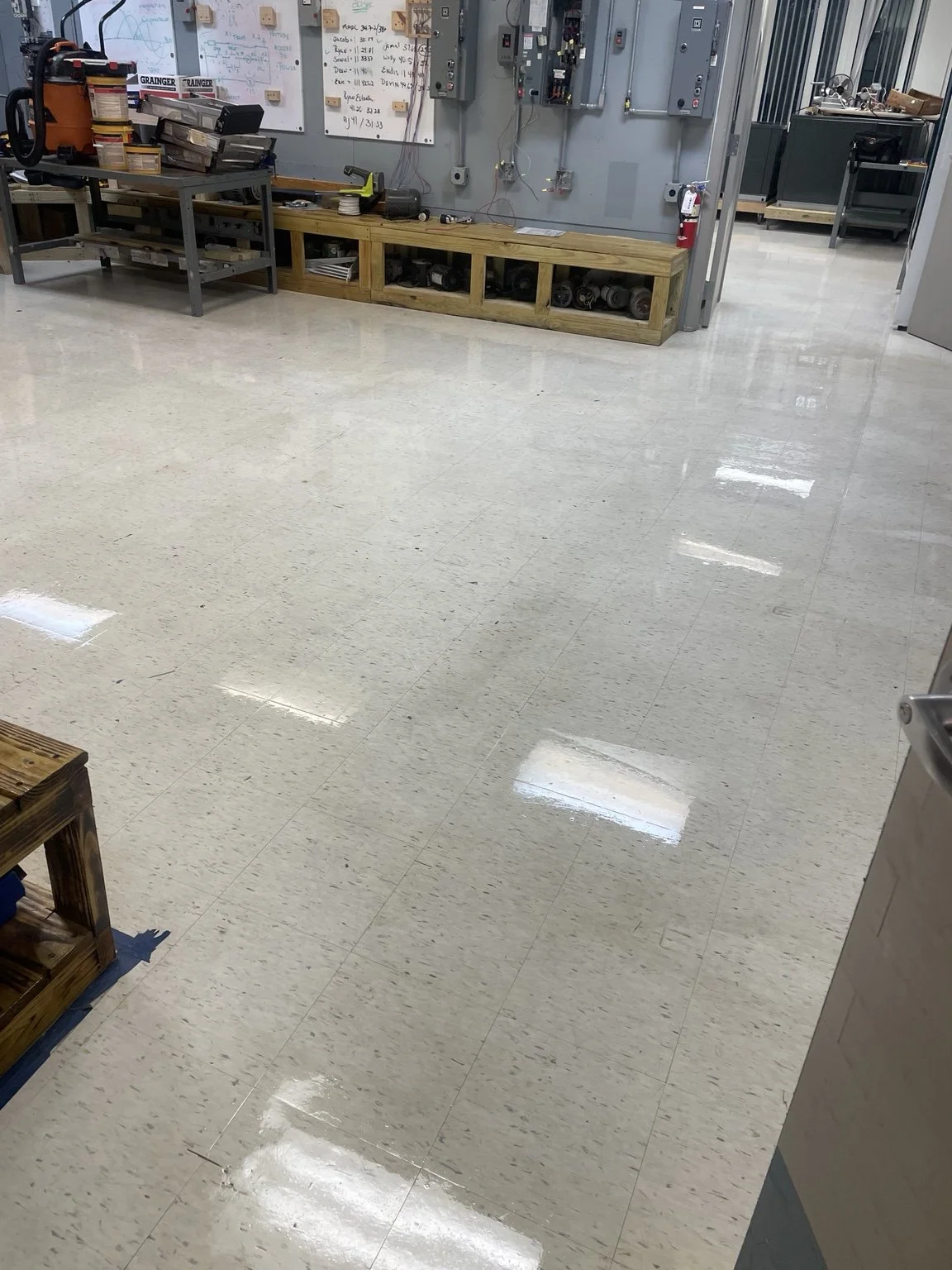 Completed HVAC training-lab floor restoration at a Brandon college by Abundance of Sunshine Inc., following removal of the old wax, deep cleaning, resealing and application of a fresh protective wax finish.