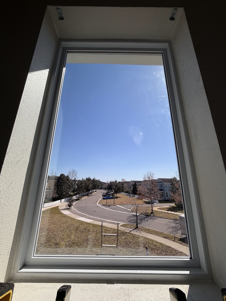 Completed second-story replacement window installation by Abundance of Sunshine Inc. in Winthrop Village, Riverview—securely fitted and finished.