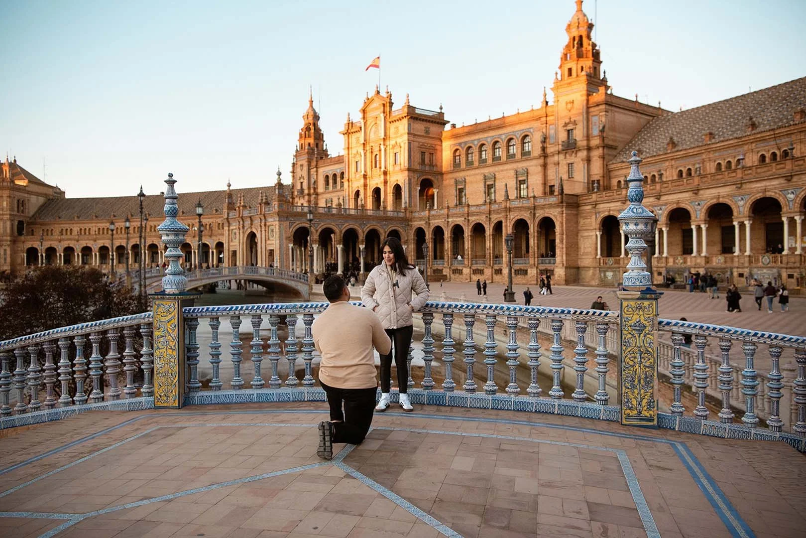 A man proposing to his girlfriend in a Star Wars scene location.