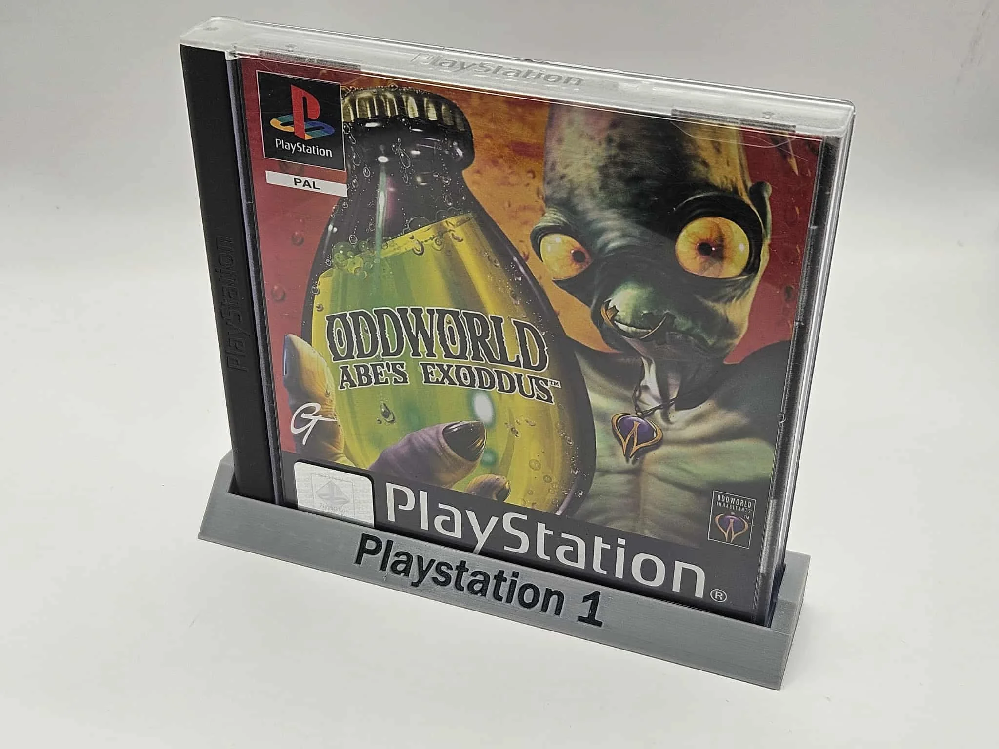 PS1 PlayStation One Game Display Stand – Retro Gaming Holder & Shelf Mount – Light Grey with Retro PlayStation Writing
