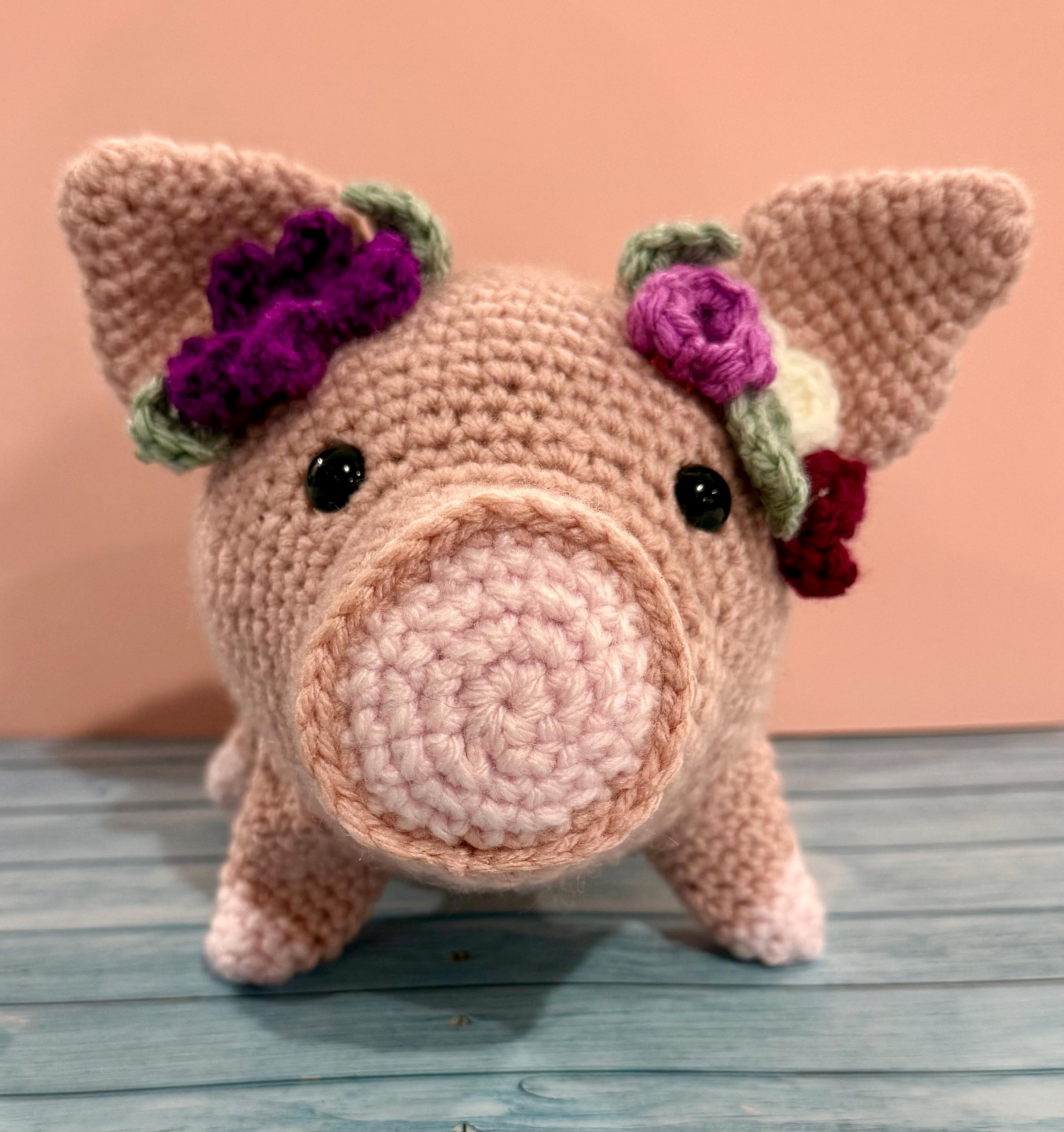 Adorable handmade crochet pig plushie, a perfect farm animal toy or gift for pig lovers.