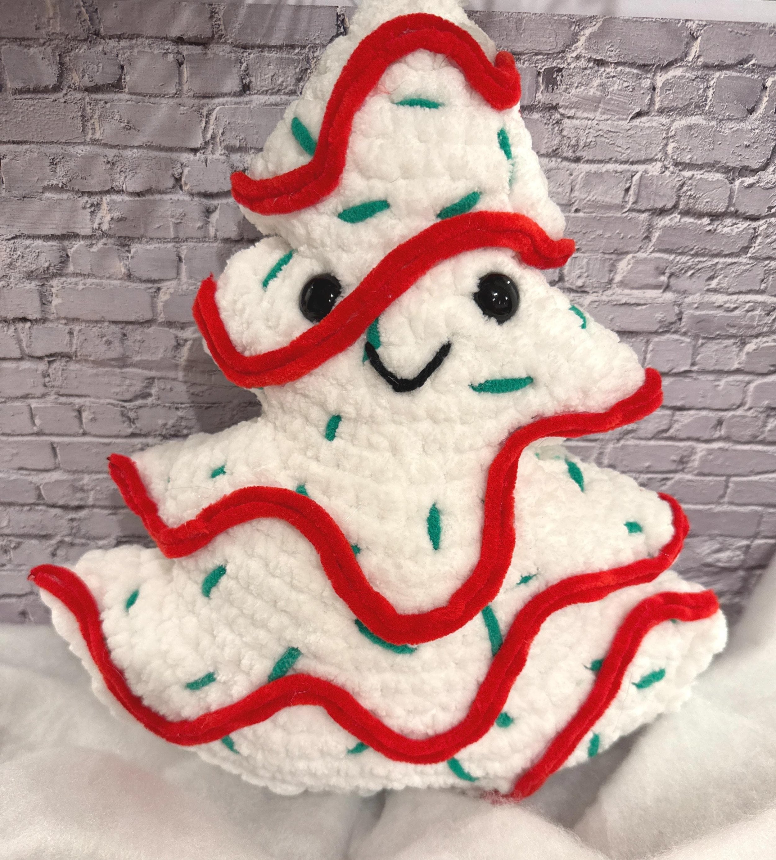 Handmade crochet Christmas tree plushies, perfect for decorating and gifting.