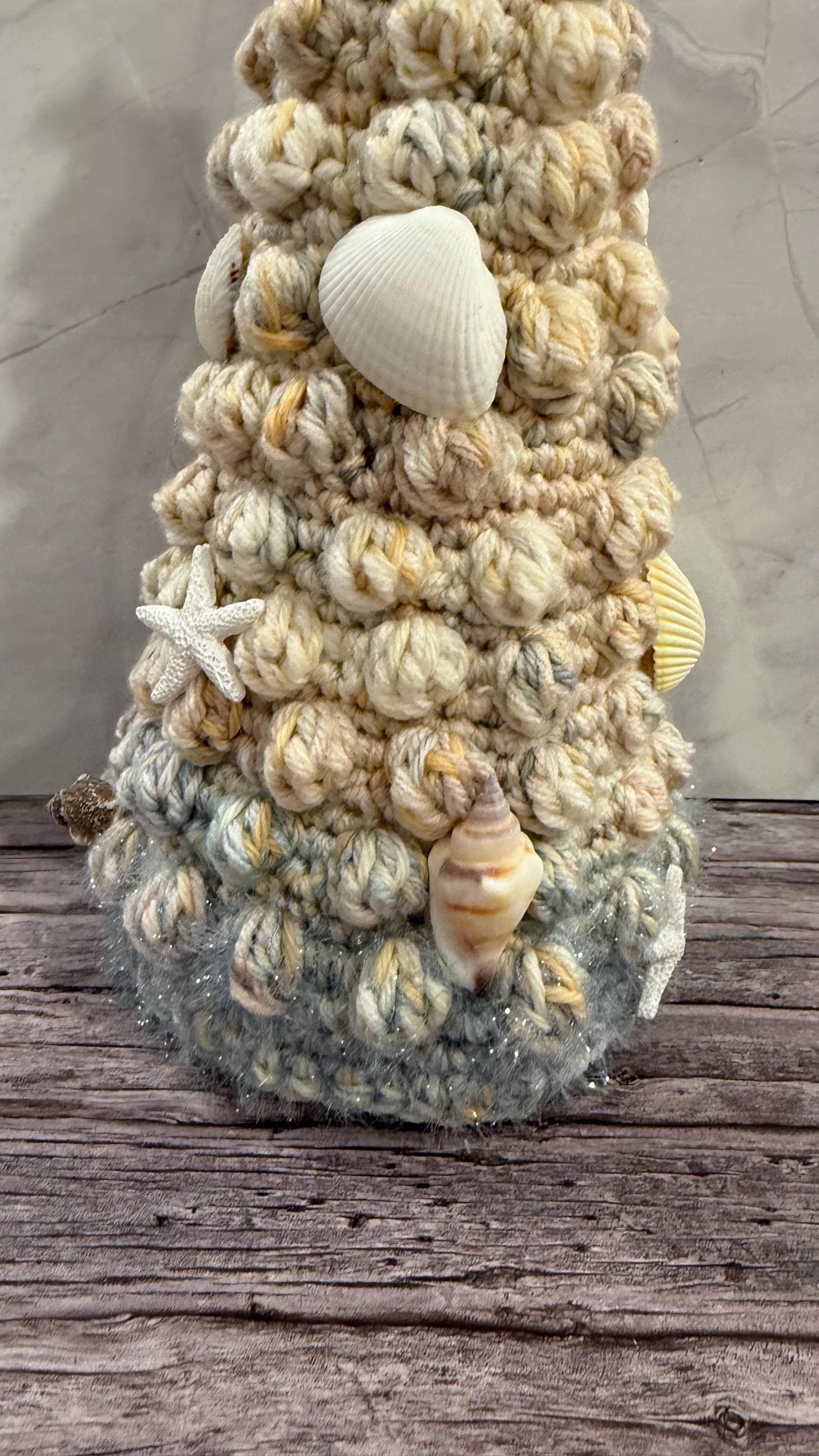 Handmade crochet Christmas tree with a beachy twist, perfect for coastal holiday decor.