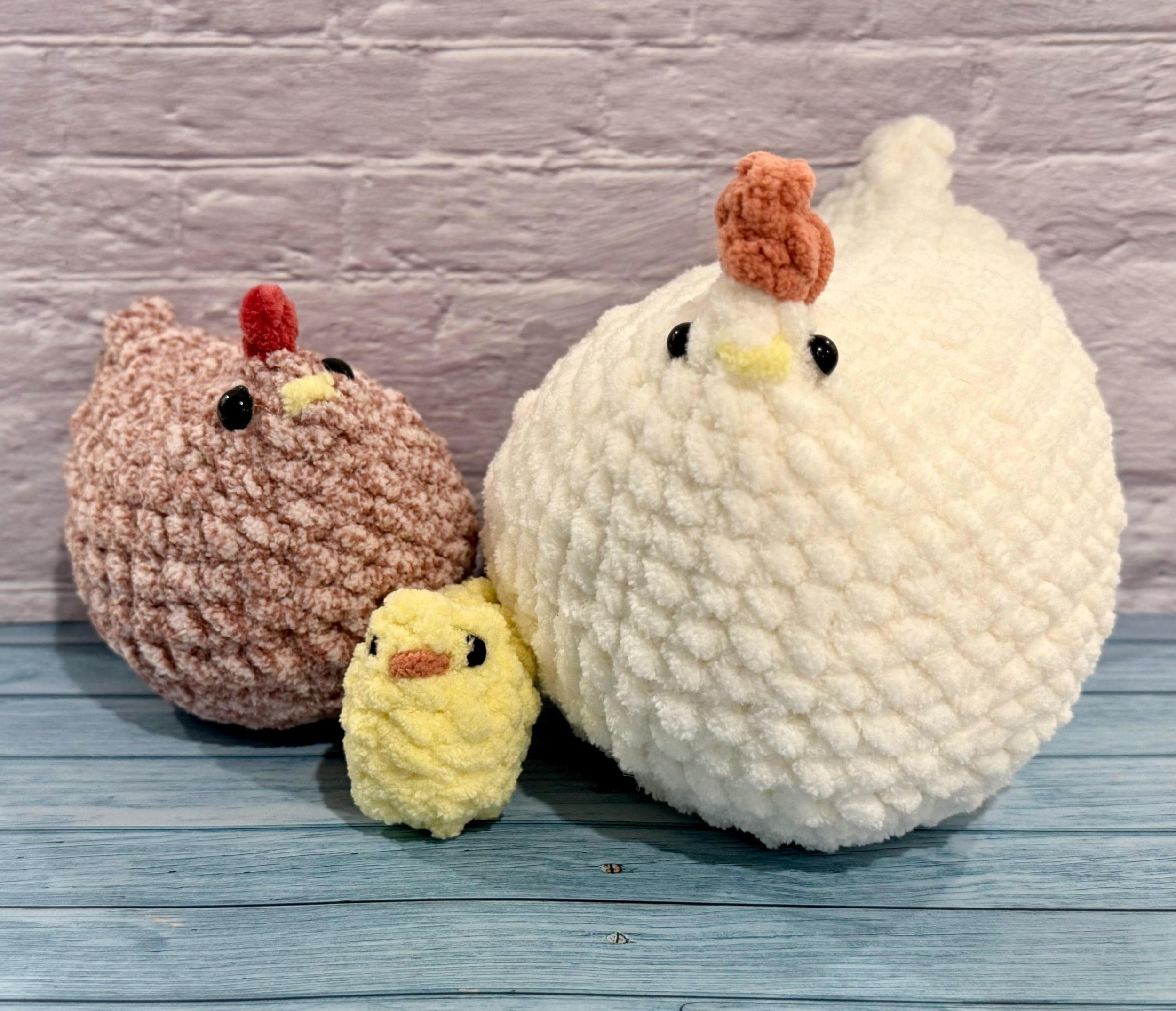 Handmade crochet hen family set, a charming and cozy farmhouse-style plush collection.