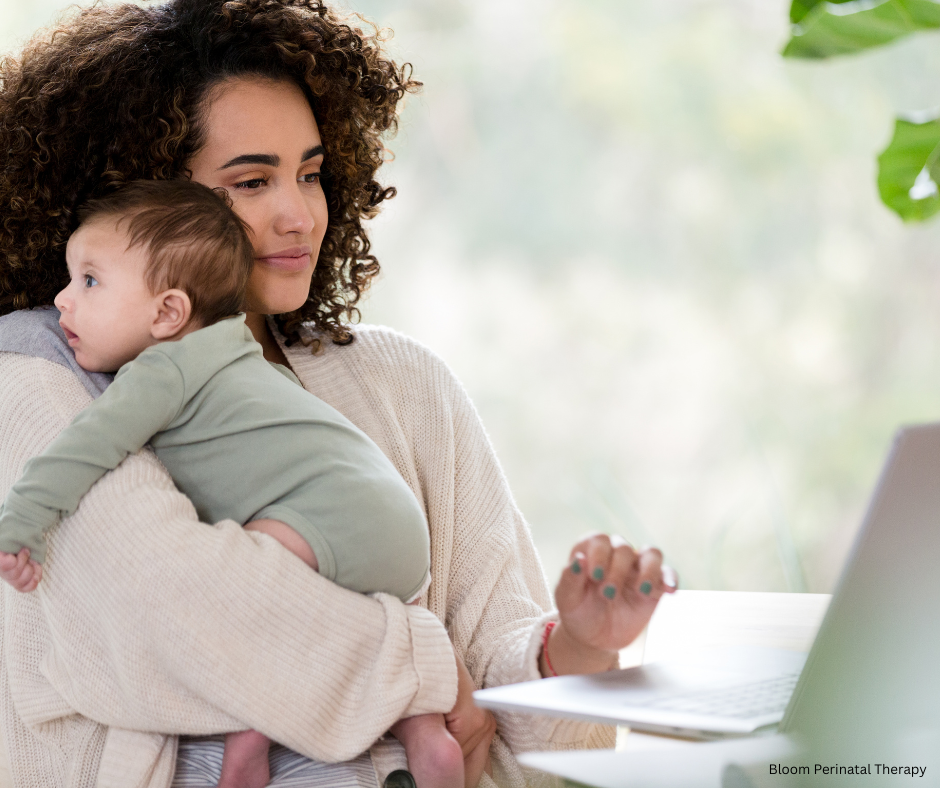New mother attending an online counseling session while caring for her baby at home.