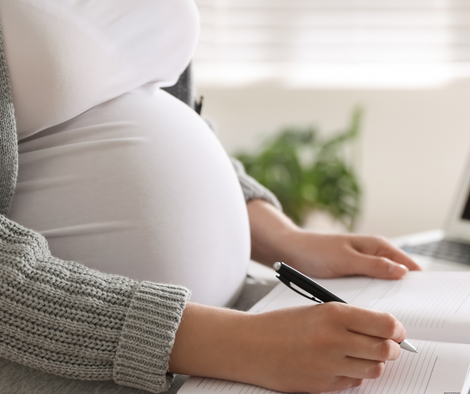 Pregnant woman creating a postpartum care plan before welcoming her baby.