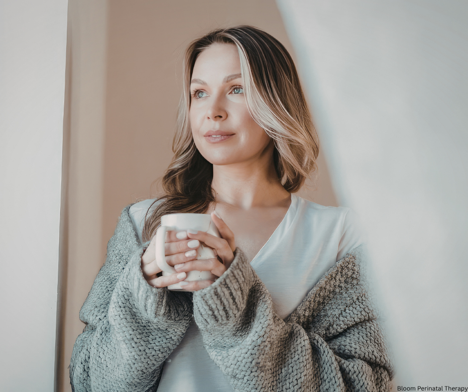Woman reflecting during her fertility journey while seeking emotional support in Missouri.