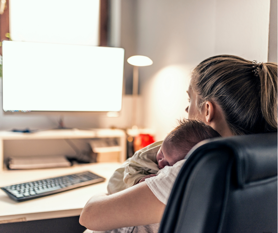 Mother participating in online postpartum therapy from home.