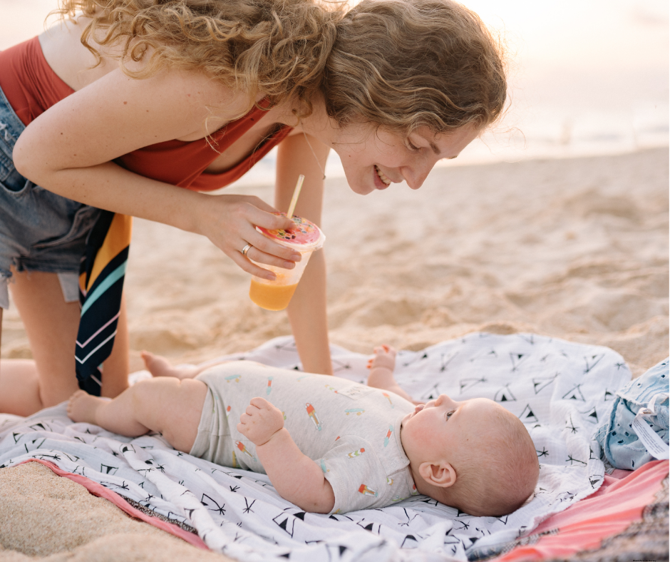 Mother enjoying time with her baby while receiving online perinatal therapy in Florida.