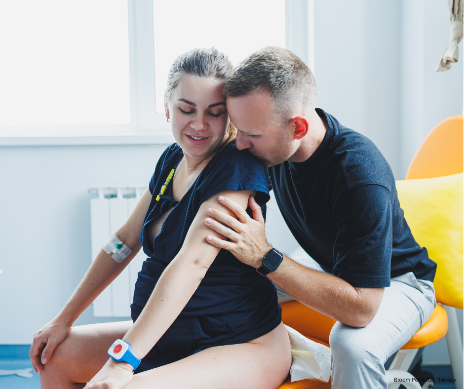 Mother receiving emotional support during labor