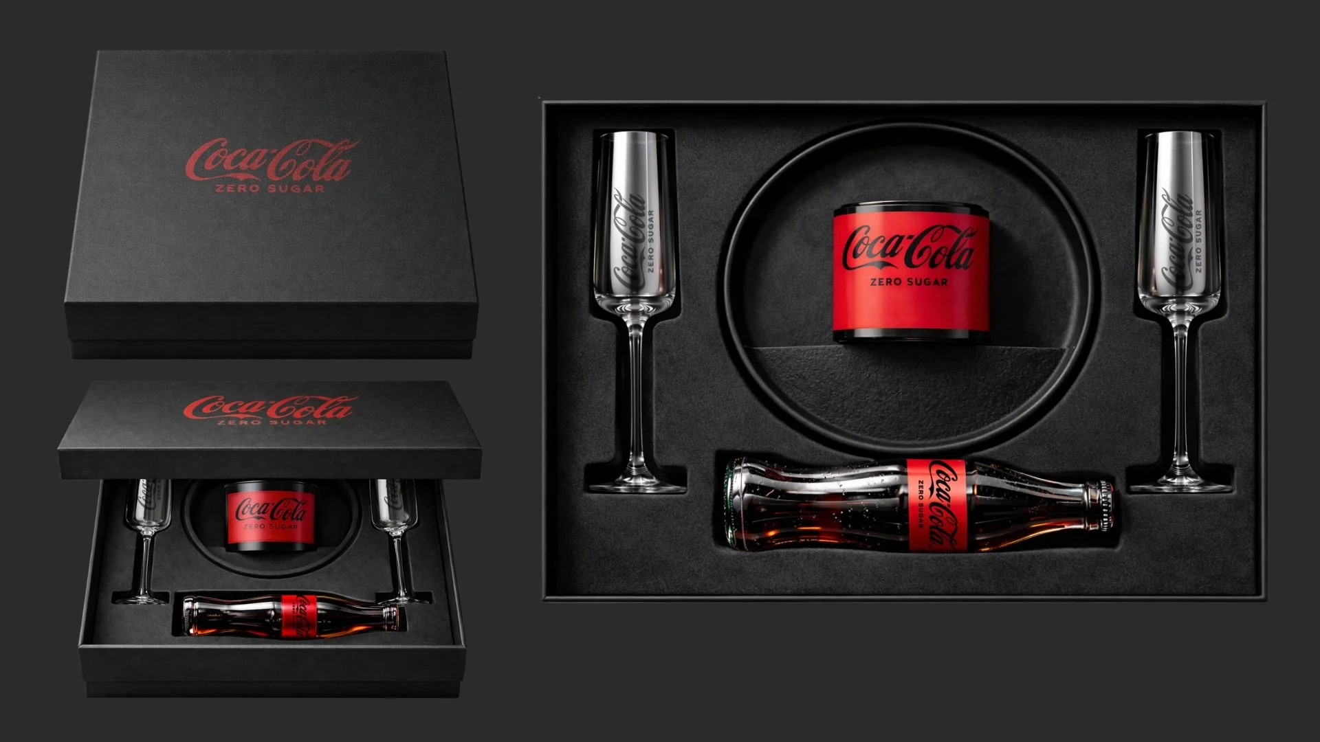 Coca-Cola Zero Sugar themed gift set with two champagne flutes, a miniature bottle, and a small tin, all featuring Coca-Cola Zero Sugar branding, arranged in a black box with a separate lid.
