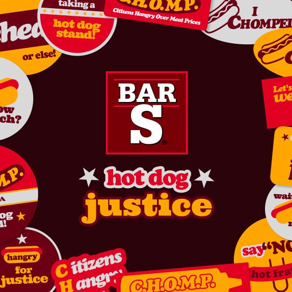 Navigation screen featuring a burger restaurant promotion, including a central red and black logo that says "BAR S," along with surrounding colorful stickers and signs advertising hot dogs, justice, and other food items and slogans.