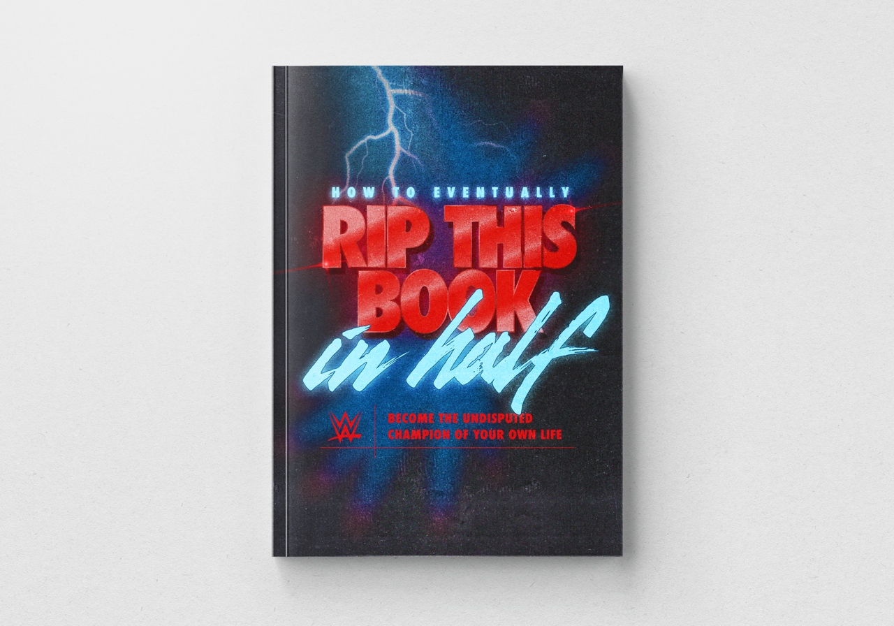 A book cover with lightning and stormy background. The title reads 'How to Eventually Rip This Book in Half' with a WWE logo and 'Become the undisputed champion of your own life' subtitle.