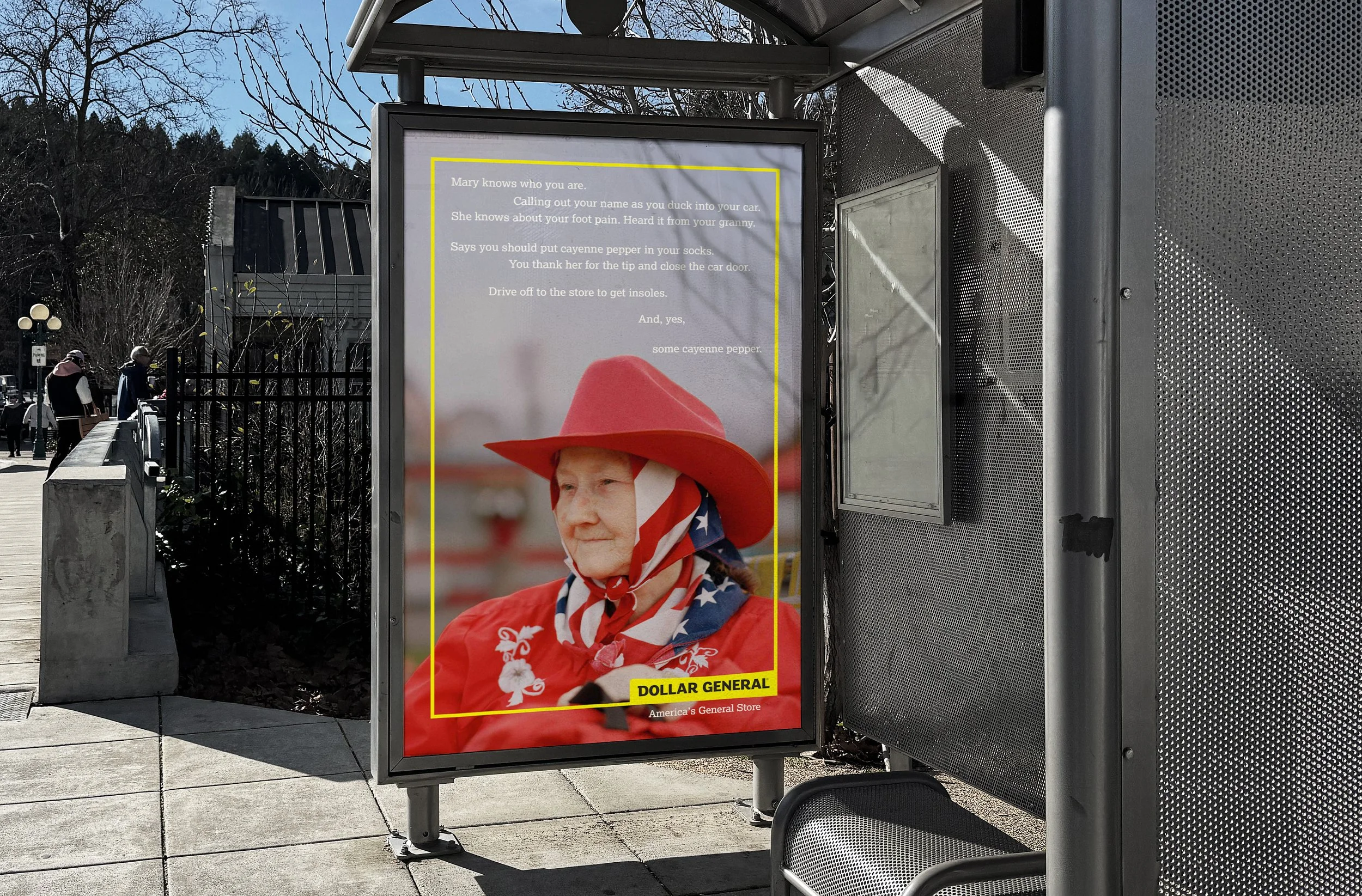 A poster at a bus stop showing a woman dressed in patriotic red, white, and blue, with a large red hat and a scarf with elements of the American flag. The poster includes text about her knowing who you are and references to cayenne pepper. The bottom has a label for Dollar General, which reads "America's General Store." The scene is outdoors with pedestrians walking nearby and clear weather.