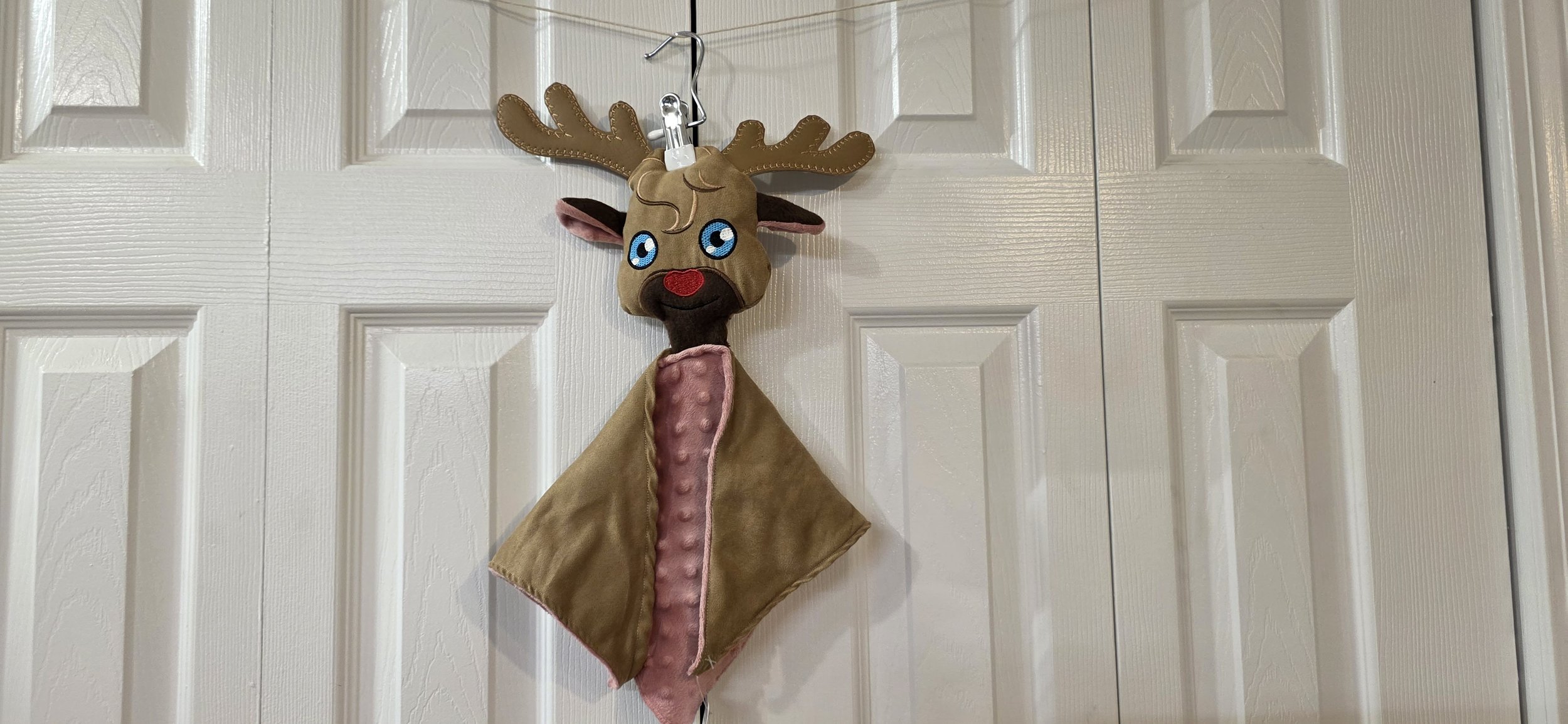 Brown and pink in the hoop embroidered reindeer lovey  with rattle.