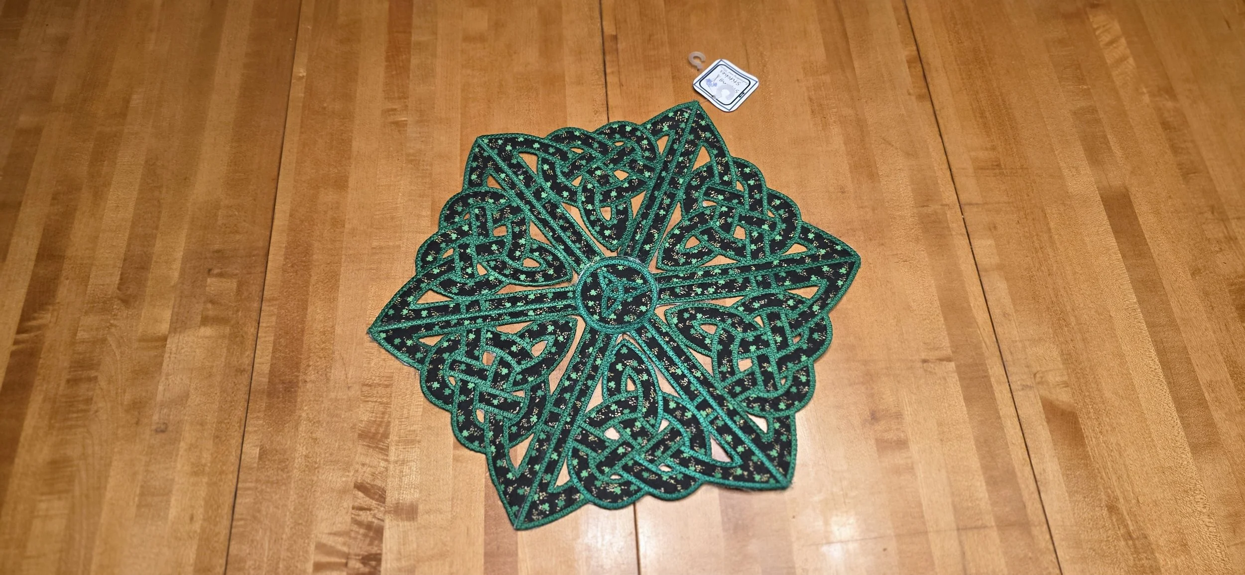 Irish cut work embroidered table topper done in the hoop