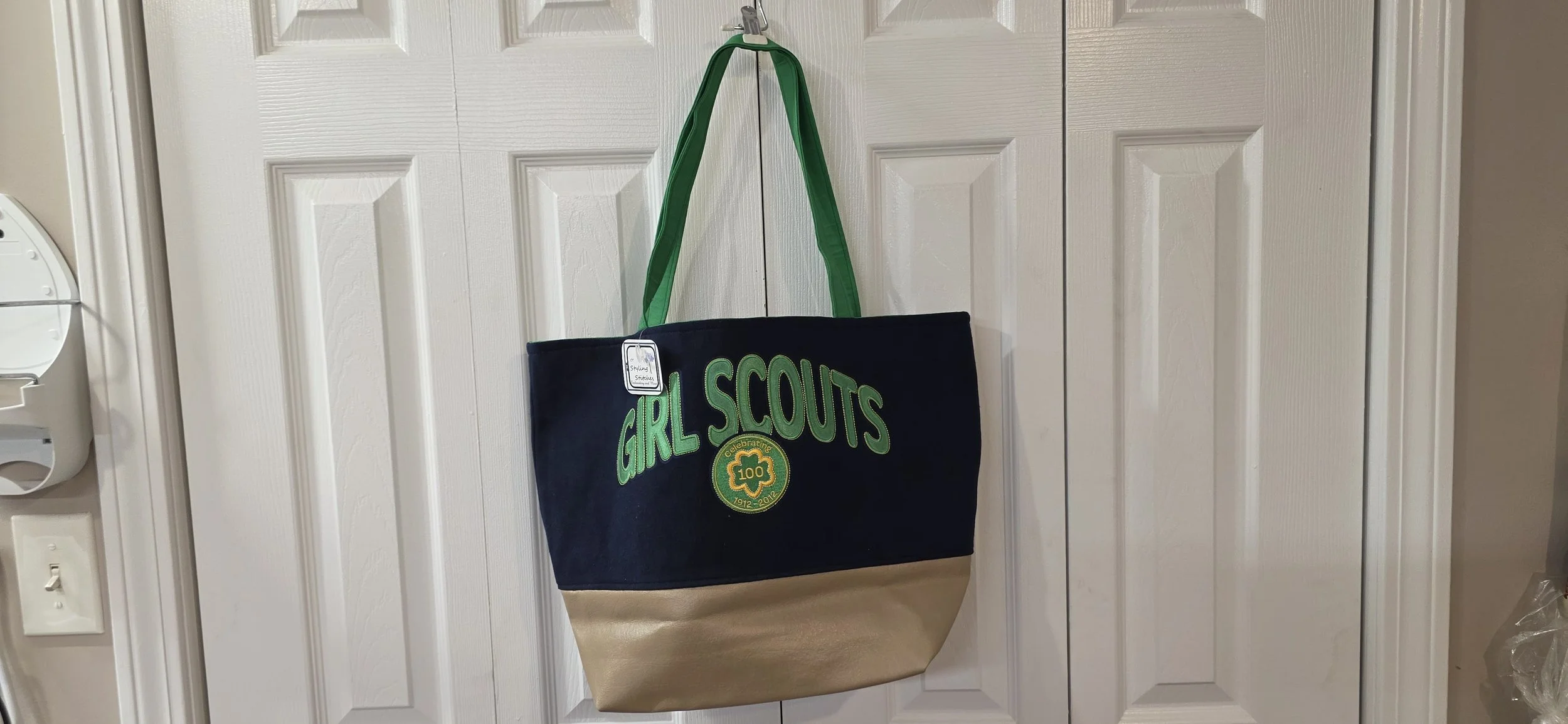 Vintage Girl Scout Sweatshirt, once a sweatshit now a tote with an inside pocket and tan brown vynal bottom. 14x19
