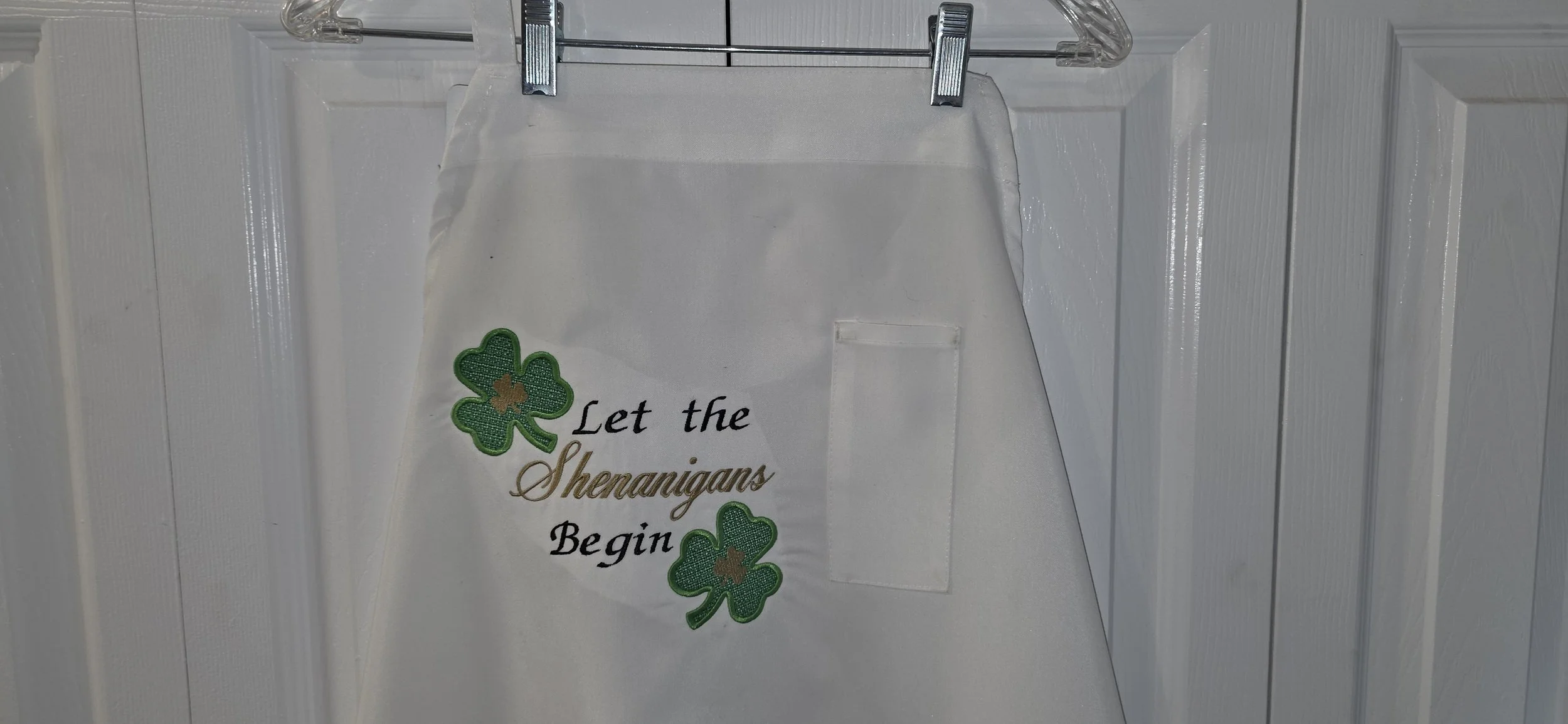 White Large embroidered apron on sale.