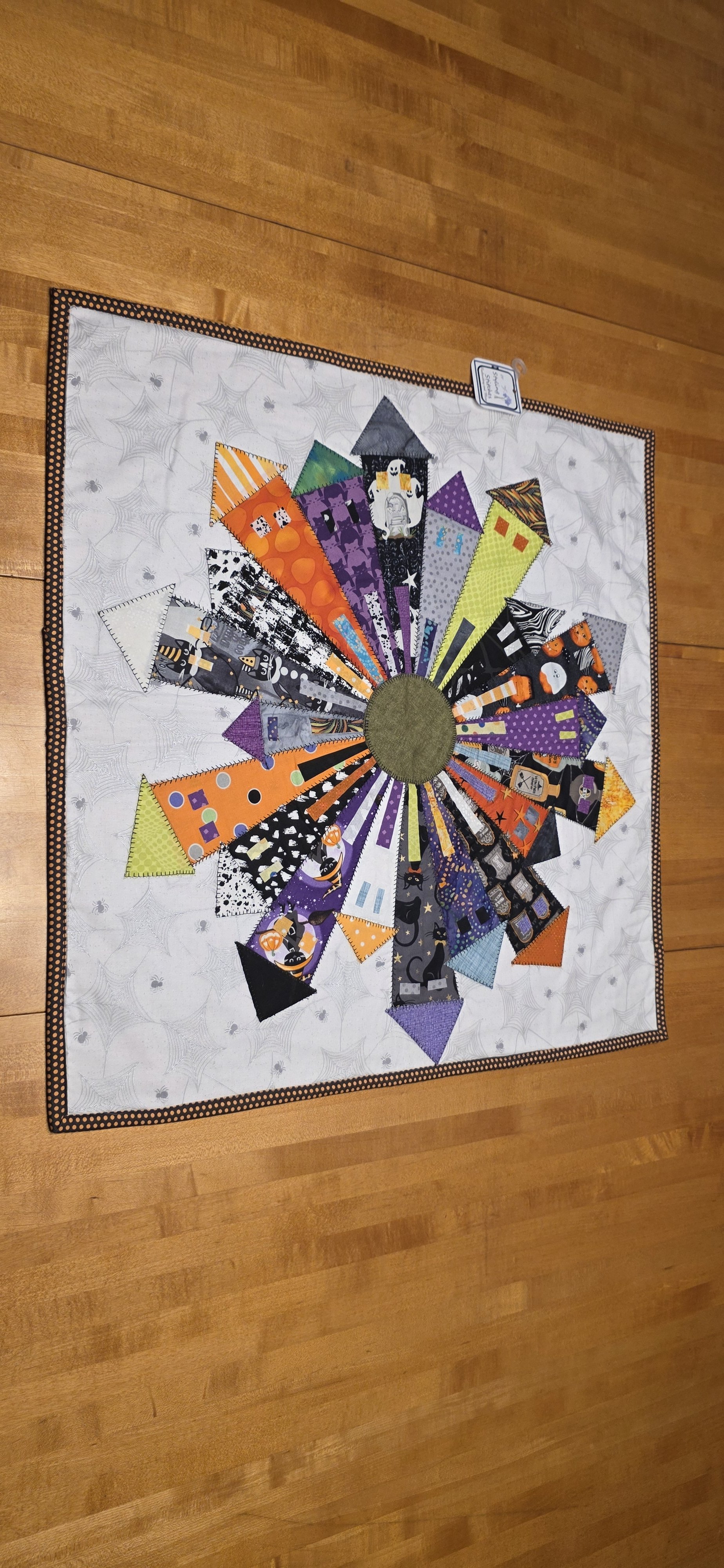 Quilted houses table topper