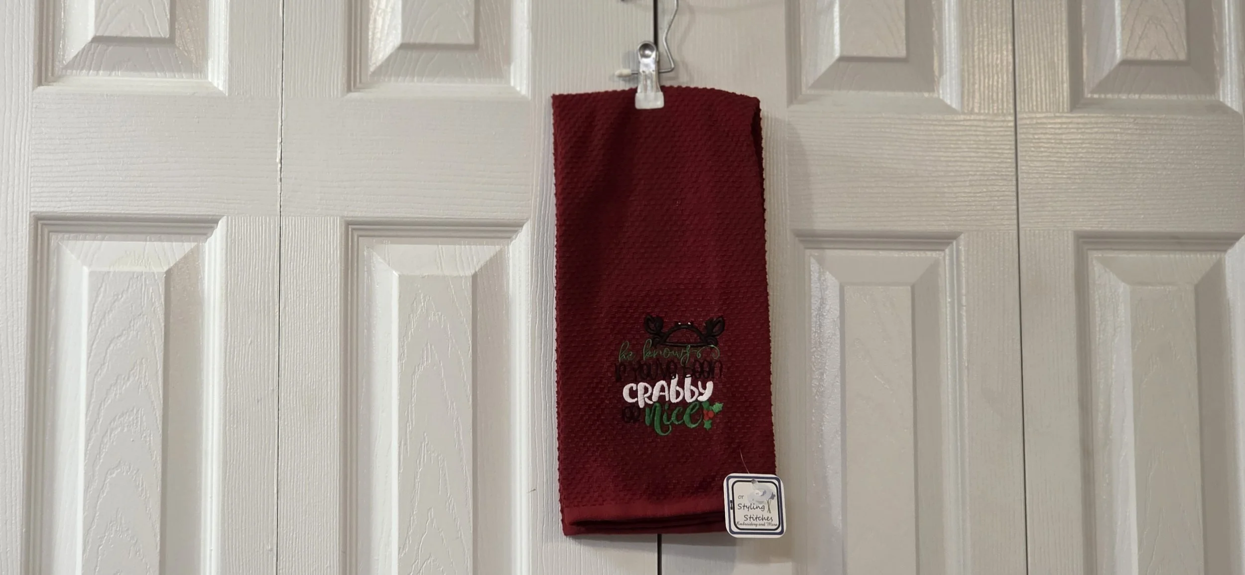 He knows if you are crabby or nice embroidered towel
