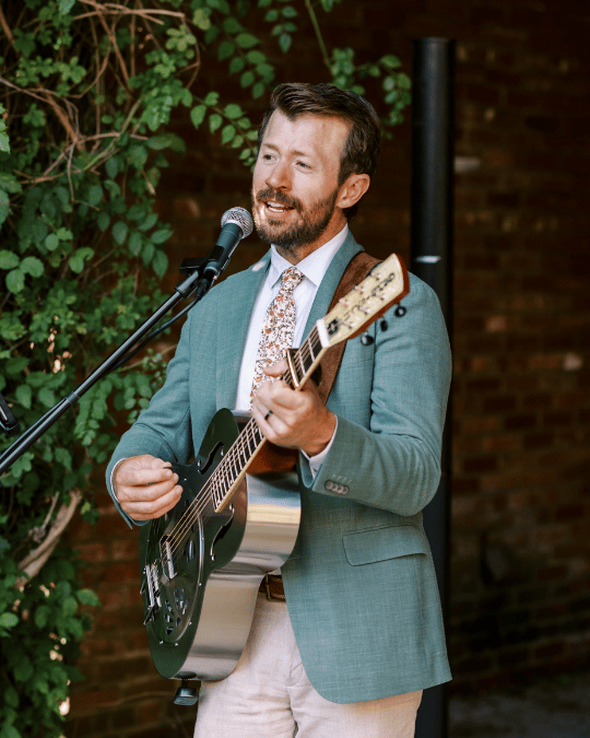 Bobby Crawford performs at a wedding cocktail hour at The Apiary in Lexington, KY